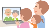 テレビ電話をする家族