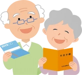 通帳と年金手帳とほほえむ老夫婦